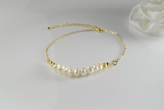 24k gold Plated good luck gift Gold Helling 5.5mm stacking White Fresh water pearl  Bracelet Rondelle, Smooth 7" for mens, womens.