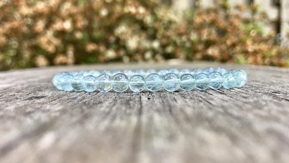 Jewelry Energy 6mm Stretchable Blue Blue Topaz Bracelet Round, Smooth 7" for mens, womens, gf, bf & Adult.