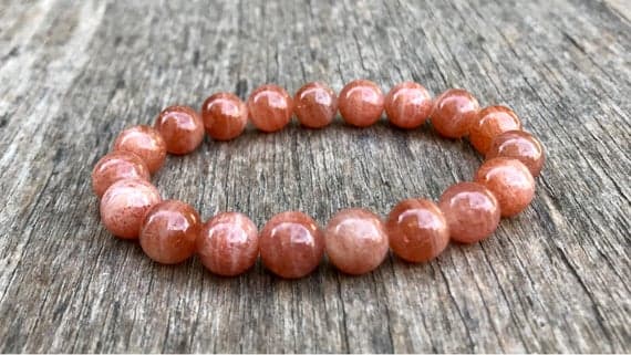 Artisan Loose 10mm Stretchable Orange Sunstone Bracelet Round, Smooth 7.5" for mens, womens, gf, bf & Adult.