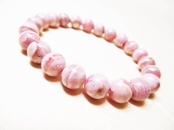 Galaxy Jewelry 8mm Stretchable pink Rhodochrosite Bracelet Round, Smooth 7" for mens, womens, GF, BF, Adults.