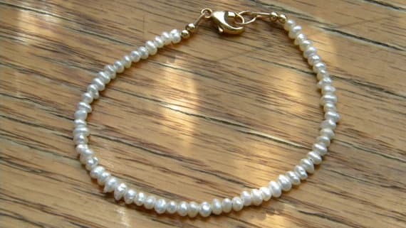 24k gold Plated good luck gift 2-3mm stacking White Freshwater Pearls Bracelet Rondelle, Smooth 7" for mens, womens, gf, bf & Adult.