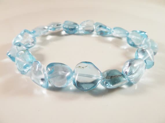Galaxy Jewelry 10x9mm Stretchable Blue Blue Topaz  Bracelet Nugget, Smooth 7" for mens, womens, gf, bf & Adult.