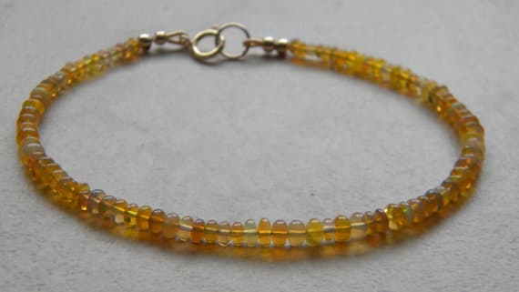 24k gold Plated Grounding 2.5-3.5mm stacking Yellow Genuine Ethiopian Opal Bracelet Rondelle, Smooth 7" for mens, womens, gf, bf & Adult.